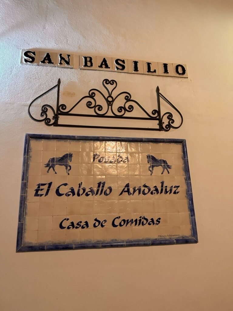 Tiled street sign for the San Basilio neighborhood